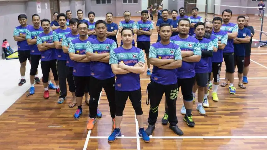 ONXON members together on a badminton court